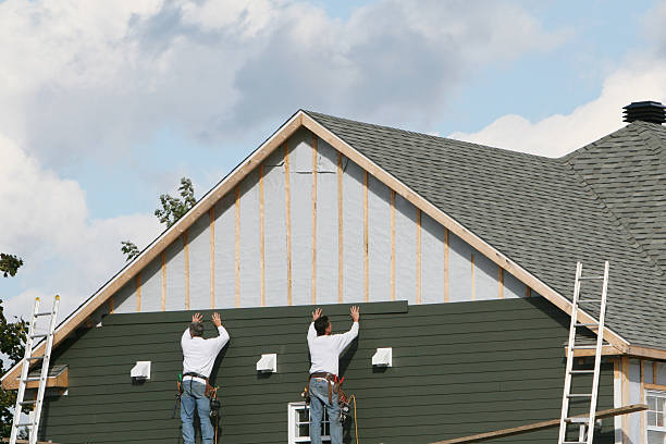 Professional Siding technician working in Georgetown, MA